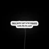 Guiding Direction in Darkness with Vibrant Rainbow Color Accents Neon Sign