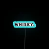 Eye-catching vibrant whisky bar decor with colorful LED lighting accents
