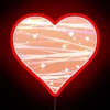 Soft white glow with vibrant peach tones in neon lighting.