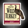 Glowing Neon Sign Reads "Wild Turkey" in Vibrant Rainbow Colors.