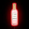 Wine lovers rejoice with vibrant nighttime ambiance provided by this sign.