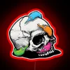 Macabre whimsy meets retro style with colorful worm string sign.