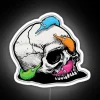 Glowing worms entwined around a skeletal skull in vibrant colors