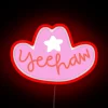 Vintage Wild West-themed neon light sign with colorful RGB backlighting.