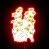 Vibrant yellow cosmos blooms shine bright with radiant RGB neon light.