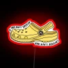 Neon sign with motivational phrase about rocking to life.