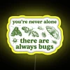 Neon Bug Sign: Whimsical Insect Friends Amidst Nighttime Ambiance Lighting