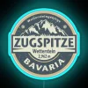 Authentic German Alps Inspiration: Vibrant Neon Sign with Mountain Emblem