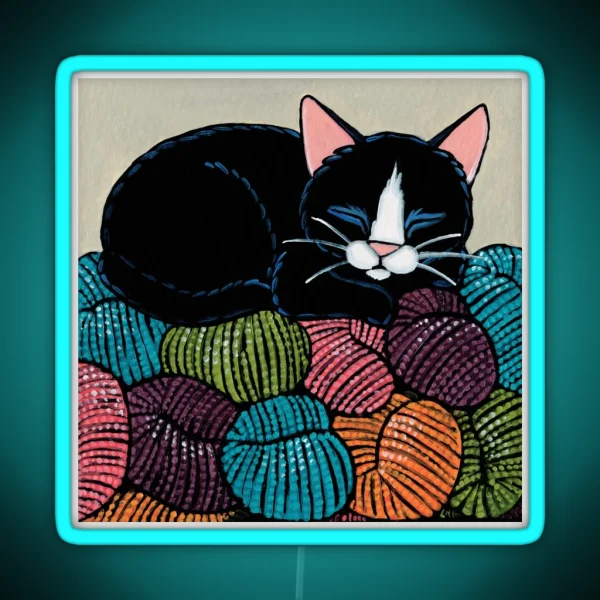 Cat Asleep On A Yarn Mountain RGB Neon Sign