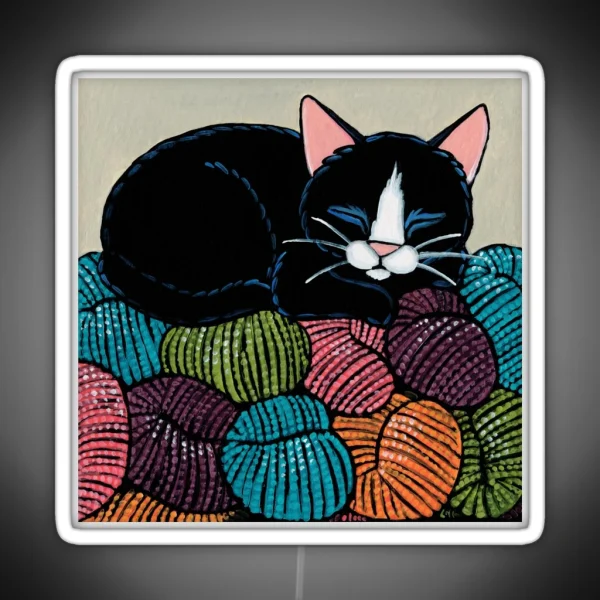 Cat Asleep On A Yarn Mountain RGB Neon Sign