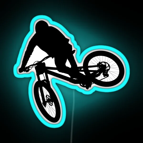 Downhill Mountain Bike Enduro Cross Mountain Biker Doing An Extreme Jump On A Mountain Bike With Helmet And Safety Equipment RGB Neon Sign