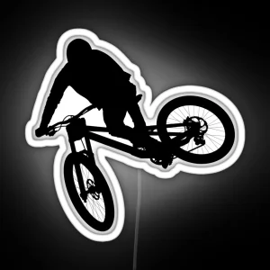 Downhill Mountain Bike Enduro Cross Mountain Biker Doing An Extreme Jump On A Mountain Bike With Helmet And Safety Equipment RGB Neon Sign