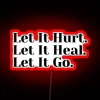 let it hurt, let it heal, let it go – rgb neon sign in red.