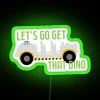 let’s go get that dino neon sign with vibrant rgb colors and bright green glow.