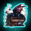Neon sign displaying 'Life is better with dragons and books' with vibrant RGB lighting and modern design.