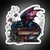 A neon sign displaying 'Life Is Better With Dragons And Books' in vibrant RGB colors.