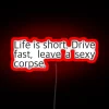 rgb-neon-sign-promoting-edgy-message-life-is-short-drive-fast-leave-a-sexy-corpse