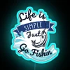 simple life just go fishing neon sign in vibrant blue colors