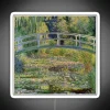 lily pad bridge painting featuring vibrant RGB neon signs