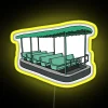 living-with-the-land boat with a vibrant RGB neon sign in yellow