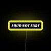 funny bumper sticker with loud neon rgb led sign, yellow neon light