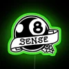 neon sign shaped as an 8-ball with rgb lighting displaying 'magic sense' in vibrant green colors.