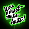 Neon Sign Reading Make Haste in RGB Colors | Green