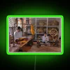 Process of making a skein from silk cocoons with an eye-catching RGB neon sign, highlighting the green color.