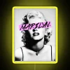 Marilyn Monroe neon sign in vibrant yellow and RGB colors.