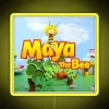 Vibrant neon sign of Maya the Bee displaying a colorful RGB design in bright yellow tones.