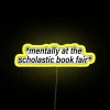 mentally at the book fair neon rgb yellow sign.