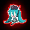 Miku with a cat neon sign in vibrant red.