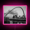 The Millennium Bridge near the Baltic Gallery in Gateshead, Newcastle, features an RGB neon sign with pink lighting.