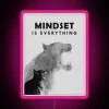 RGB neon sign displaying "Mindset Is Everything" in vibrant pink colors.