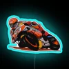 MotoGP rider with vibrant RGB neon sign - blue.