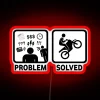 A fun LED RGB neon sign on a dirt bike motorbike that solves your funny problems.