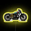 A cool RGB neon sign displaying a motorcycle in vibrant yellow.