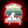rgb neon sign featuring mountains and exploring