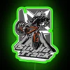 Mountain bike downhill ride with neon green RGB lighting sign.