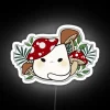 alt text: RGB neon sign displaying a vibrant mushroom cat