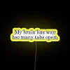 A brain illustration showing multiple tabs open in a vibrant neon RGB design with yellow accents.
