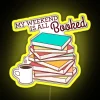 neon sign displaying 'my weekend is all booked' - vibrant rgb yellow.