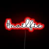 rgb neon sign spelling 'nailfie hashtag' in red.