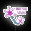 RGB neon sign displaying motivation with neurons in vibrant white.