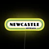 Retro Vintage Newcastle City Australia Neon Sign in RGB Yellow Light
