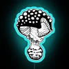 neon sign with rgb lighting showing a blue nibbled fly agaric mushroom.