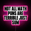Math puns can be fun - vibrant RGB neon sign saying 'Not All Math Puns Are Terrible - Just Sum Pink'.