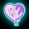 neon sign with a colorful kawaii heart symbol in yami style, featuring rgb lighting effects and glowing blue tones.