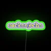 Neon sign displaying 'Oberlausitzer dialect' in RGB colors with a green glow.