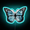 Neon Sign Featuring an Ocean Butterfly Design in Vibrant Blue and RGB Colors, Modern Art Display.